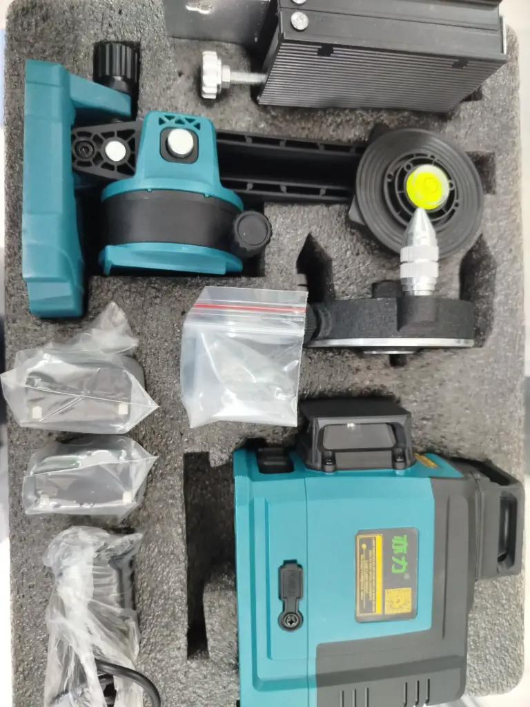 Niveau láser avec trepieds.